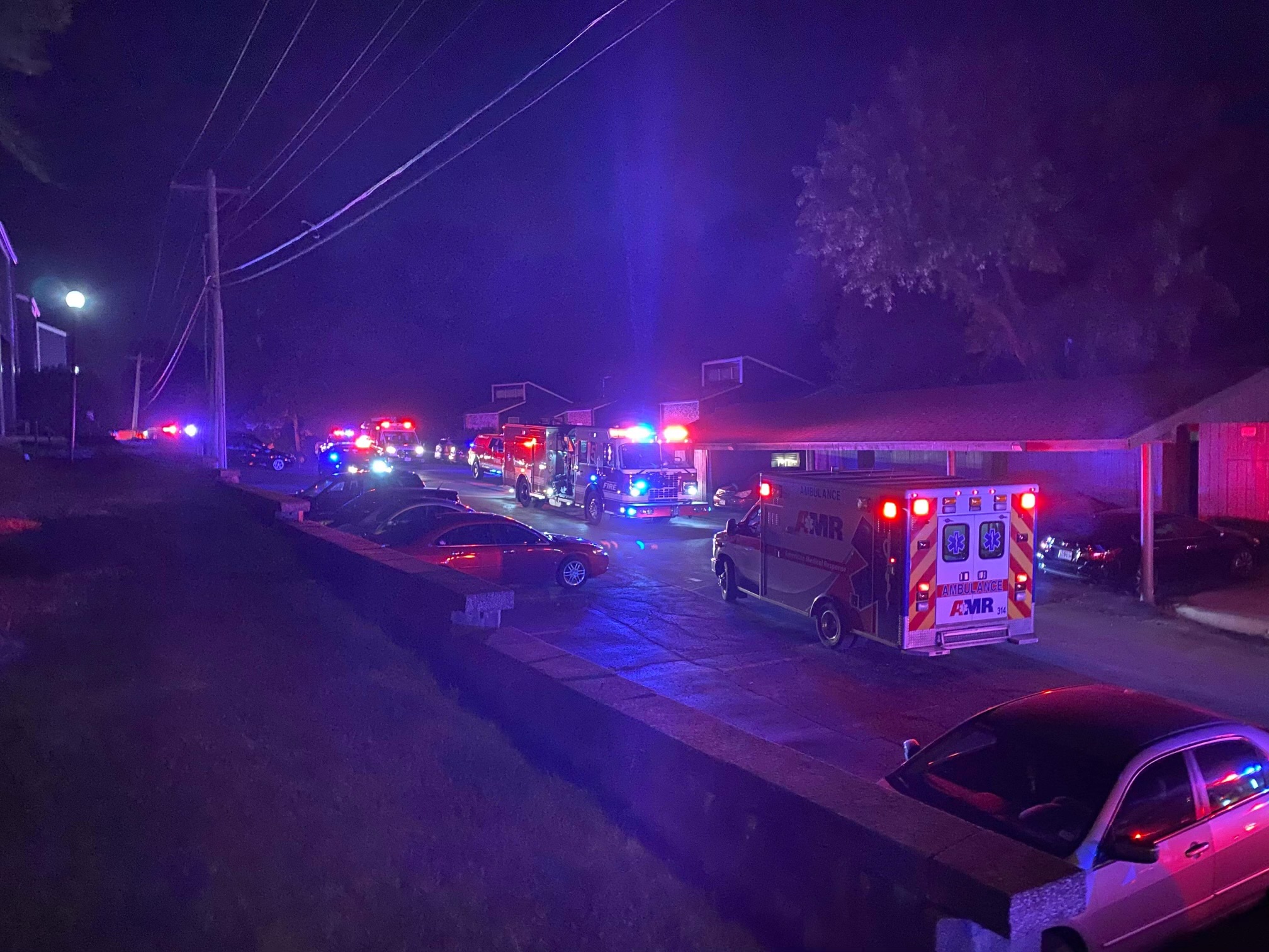 Fire and EMS staff respond to a fire at the Cedar Brook Apartment complex on July 4, 2022.