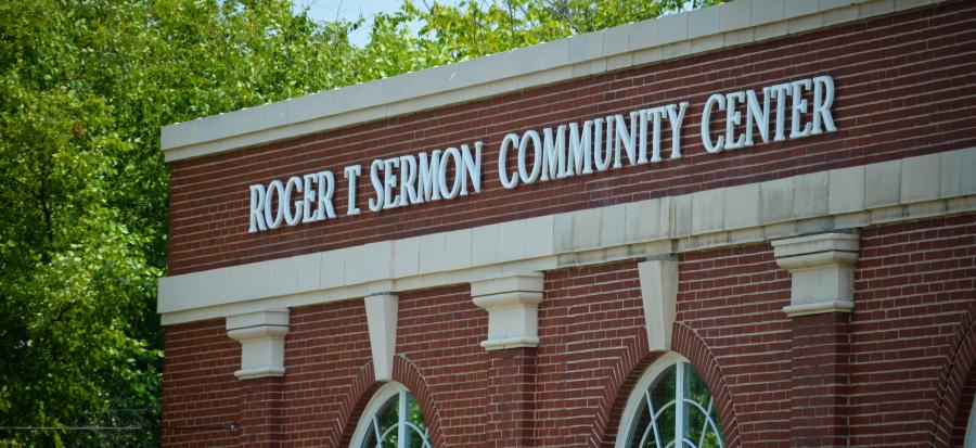 A close view of the sign of the Roger T. Sermon center.