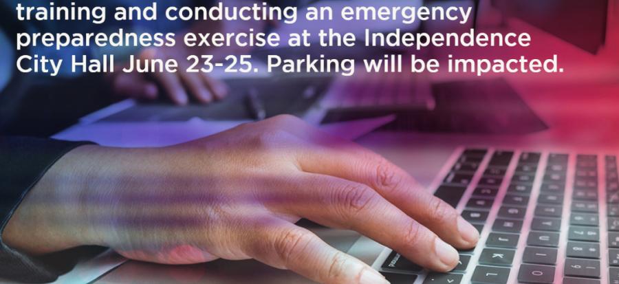 Emergency Preparedness Training and Exercise - Information technology experts will be training and conducting an emergency preparedness exercise at the Independence City Hall June 23-25. Parking will be impacted. Image of hand typing on keyboard with red and blue light effects over it.