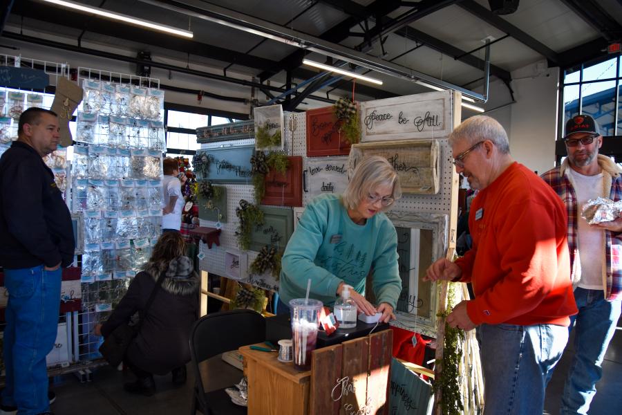 Image of an individual buying a holiday craft