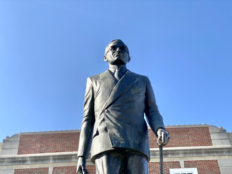 Looking up at the statue of President Truman walking with his cane on the east side of the Historic Truman Courthouse in Independence, Mo.