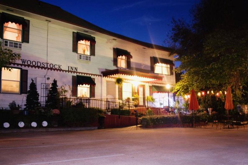 Image of Woodstock Inn at night with lights on