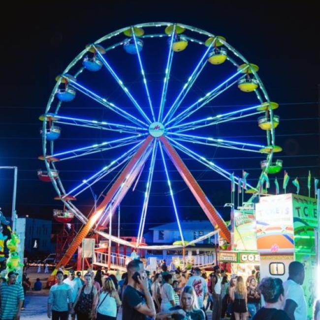 Santa Caligon Ferris Wheel is illuminated at night